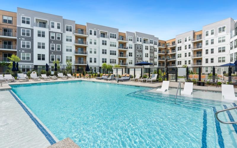 a pool in front of a building