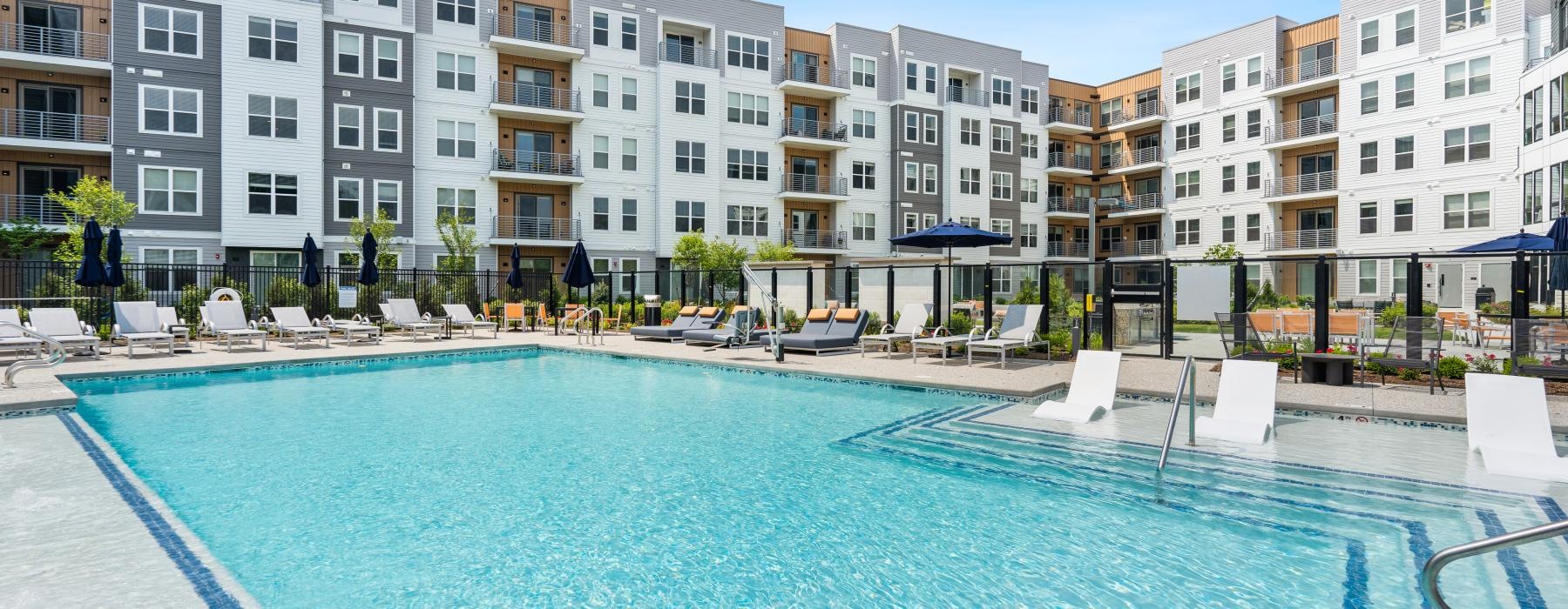 a pool in front of a building